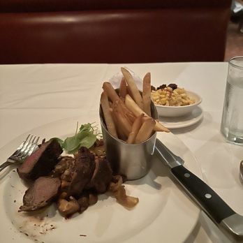 The Capital Grille - Sliced Filet Mignon with Cipollini Onions, Wild Mushrooms and Fig Essence - Steakhouses Near Me - Memphis, Tennessee The Capital Grille - Sliced Filet Mignon with Cipollini Onions, Wild Mushrooms and Fig Essence - Steakhouses Near Me - Memphis, Tennessee