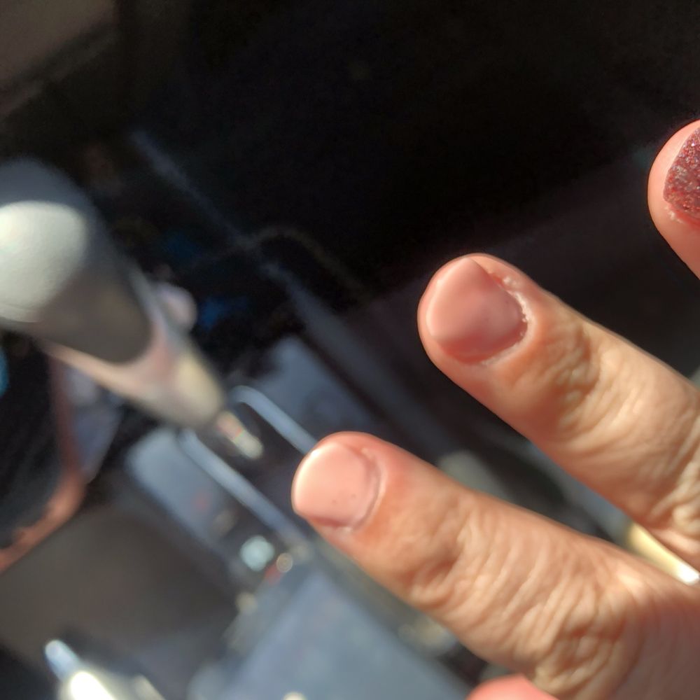 Salon 95 - Nail polish on cuticles which made the polish lift a few days later. - Hair Salons Near Me - Fernley, Nevada