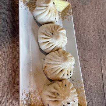 Dumpling The Noodle - Signature Pork Onion Bun (this is the nice side of the buns, the other side (put nicely) was not as pretty! - Noodles Near Me - Seattle, Washington Dumpling The Noodle - Signature Pork Onion Bun (this is the nice side of the buns, the other side (put nicely) was not as pretty! - Noodles Near Me - Seattle, Washington