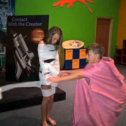 Cypress Point Community Church - The kids racing to wrap the mummy the fastest during the 56-er's holiday costume party last year. My kids loved every second of it.