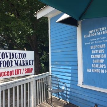 Covington Seafood Market & Bar-B-Que - a blue building with a sign that says covington seafood market - Seafood Markets Near Me - Covington, Georgia Covington Seafood Market & Bar-B-Que - a blue building with a sign that says covington seafood market - Seafood Markets Near Me - Covington, Georgia