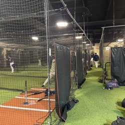 PMI Batting Cages - 10 Batting cages , cathedral High School Varsity Baseball team training