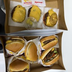 Cheeseburgers, Flying Dutchman, and spread and peppers