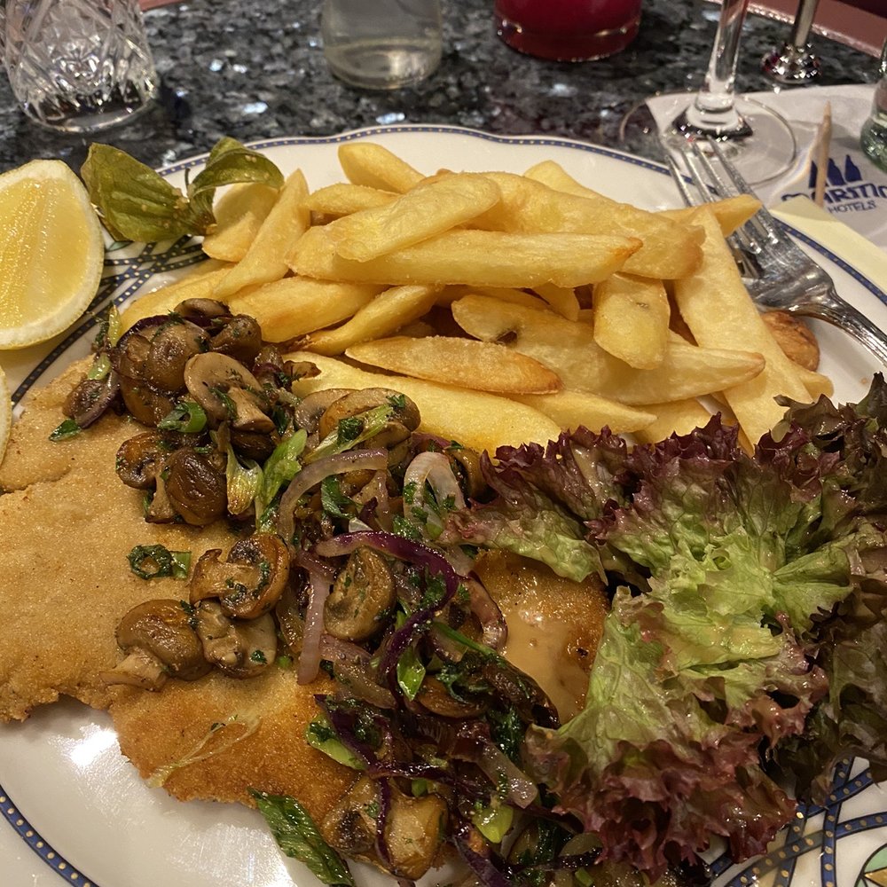 Maritim Hotel Bremen - Pork Schnitzel with mushrooms and the salad, though simple, had the BEST sweet dressing on it I've ever tasted! - Hotels Near Me - Bremen, HB