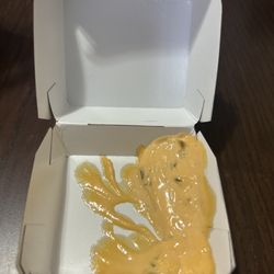 McDonald's - We order 4 pieces chicken nuggets happy meal and when we open the chicken nuggets box, this is what we got.