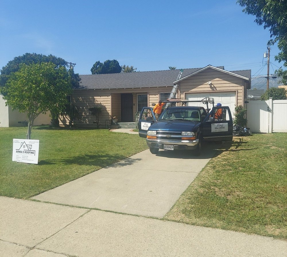 Slide of Arnol's Roofing