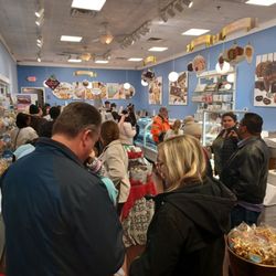 Kilwins - Waiting in line to get my honey a caramel apple with nuts & chocolate, it's one of her favorites. New Years Eve 2024