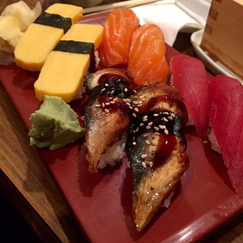 Coach Sushi - My plate of 4 nigiri (tamako, uni, salmon and tuna). - Sushi Bars Near Me - Oakland, California Coach Sushi - My plate of 4 nigiri (tamako, uni, salmon and tuna). - Sushi Bars Near Me - Oakland, California