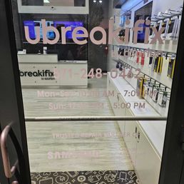 Exterior outside entrance of uBreakiFix by Asurion - Looking inside our lobby at Gainesville, VA uBreakiFix. - Gainesville, Virginia Exterior outside entrance of uBreakiFix by Asurion - Looking inside our lobby at Gainesville, VA uBreakiFix. - Gainesville, Virginia