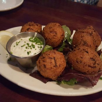 Highland Kitchen - Hush puppies. Not your typical sweet ones. These are savory. - New American Near Me - Somerville, Massachusetts