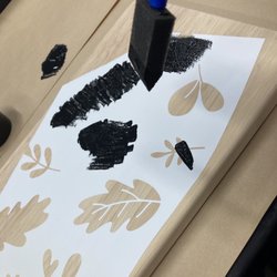 Urban Artisan - Applying ink to the stenciled boards