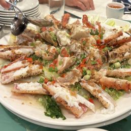 Fresh steam crab over noodles.