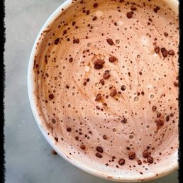 Latte with some sprinkles of chocolate Latte with some sprinkles of chocolate