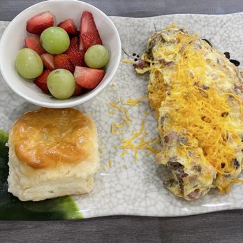 Oak St Cafe - Lonestar omelet. It has sausage, ham, bacon and cheese and big enough to share. - Breakfast & Brunch Near Me - Roanoke, Texas Oak St Cafe - Lonestar omelet. It has sausage, ham, bacon and cheese and big enough to share. - Breakfast & Brunch Near Me - Roanoke, Texas
