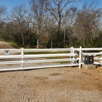 The Fence Man - Automated sliding PVC cantilever gate - Fences & Gates Near Me - Fort Smith, Arkansas The Fence Man - Automated sliding PVC cantilever gate - Fences & Gates Near Me - Fort Smith, Arkansas