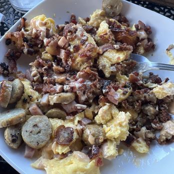 The Buttered Biscuit - Meat lovers scramble - Breakfast & Brunch Near Me - Fayetteville, Arkansas The Buttered Biscuit - Meat lovers scramble - Breakfast & Brunch Near Me - Fayetteville, Arkansas