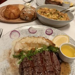 1/2 of the 12oz fillet and 1/2 lobster tail and Mac and cheese! 1/2 of the 12oz fillet and 1/2 lobster tail and Mac and cheese!