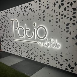 Exterior outside entrance of Patio By La Pasha - The sign at night - Houston, Texas Exterior outside entrance of Patio By La Pasha - The sign at night - Houston, Texas