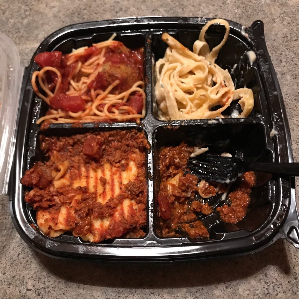 Fazoli's - Me digging into my Ultimate Sampler, a great dish with lots of food for a reasonable price! - Italian Near Me - Wausau, Wisconsin