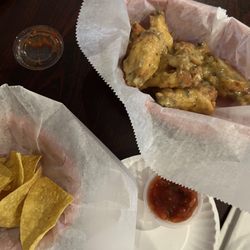 Chopos Northside Bar - Garlic parm wings w/ chips and salsa