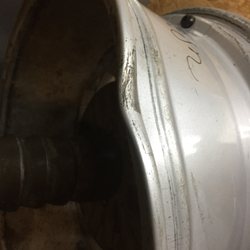 Mackinaw Wheel Repair - Bent wheel with tire removed
