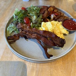 Cage Free Scrambled Eggs with Bacon and crispy potatoes.