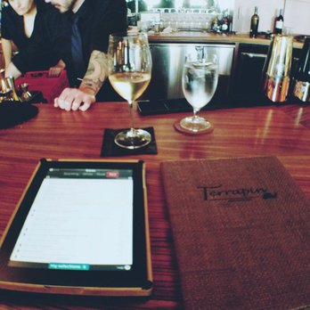 Terrapin Restaurant - Mobile device for drinks and menu with french Sauvignon Blanc in the background with our fab bartenders - New American Near Me - Virginia Beach, Virginia Terrapin Restaurant - Mobile device for drinks and menu with french Sauvignon Blanc in the background with our fab bartenders - New American Near Me - Virginia Beach, Virginia