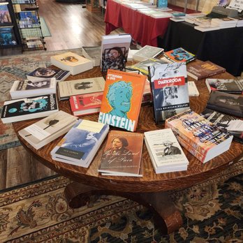 Your Brother's Bookstore - Books on a table - Bookstores Near Me - Evansville, Indiana