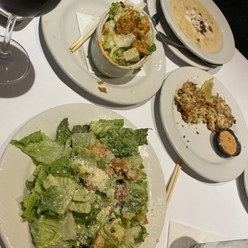 Bonefish Grill - Our spread bang bang shrimp, Caesar Salad, crab cakes, and crab cowder - Seafood Near Me - Franklin, Tennessee