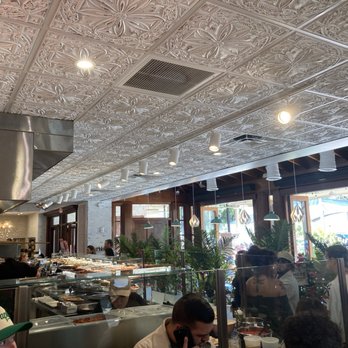 Slice Shop - Counter and beautiful tin roof - Pizza Near Me - Naples, Florida