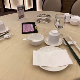 Table setting with both personal and common chopsticks. Table setting with both personal and common chopsticks.