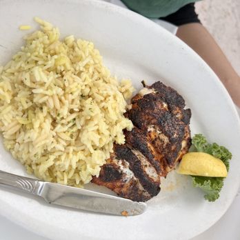 Jetty's Waterfront Restaurant - Blackened grouper with rice pilaf - Seafood Near Me - Jupiter, Florida Jetty's Waterfront Restaurant - Blackened grouper with rice pilaf - Seafood Near Me - Jupiter, Florida