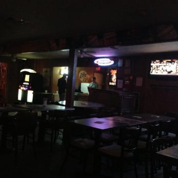 Squeeze's - a dimly lit restaurant with tables and chairs - Cafes Near Me - Beaumont, Texas Squeeze's - a dimly lit restaurant with tables and chairs - Cafes Near Me - Beaumont, Texas