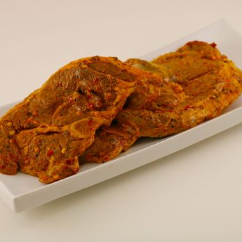 Spice Meat Shop - Lamb steaks-Cut into 1/2" pieces and marinated In our Indian spices and yogurt marinade. - Meat Shops Near Me - Surrey, British Columbia Spice Meat Shop - Lamb steaks-Cut into 1/2" pieces and marinated In our Indian spices and yogurt marinade. - Meat Shops Near Me - Surrey, British Columbia
