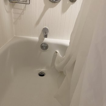 Courtyard by Marriott Milwaukee Downtown - Shower curtain in the tub, rickety handles - Hotels Near Me - Milwaukee, Wisconsin