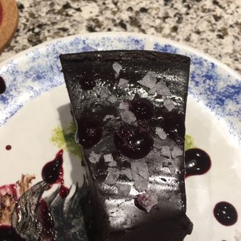Wine Down Bistro & Lounge - Flourless chocolate cake with salt on top. - Breakfast & Brunch Near Me - Ooltewah, Tennessee Wine Down Bistro & Lounge - Flourless chocolate cake with salt on top. - Breakfast & Brunch Near Me - Ooltewah, Tennessee