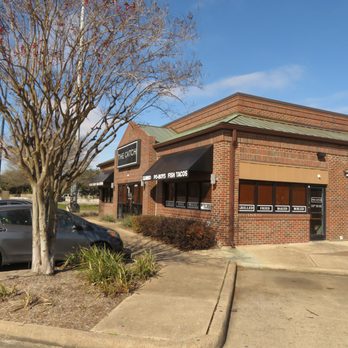 The Catch: S Post Oak - a car parked in front of a building - Seafood Near Me - Houston, Texas The Catch: S Post Oak - a car parked in front of a building - Seafood Near Me - Houston, Texas