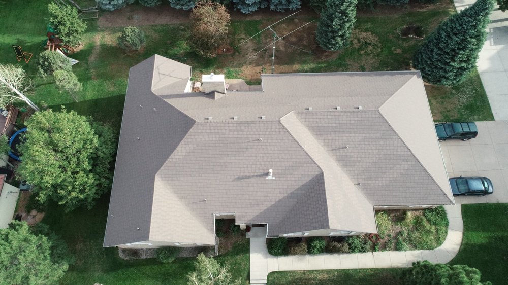 Slide of Masters Roofing & Construction