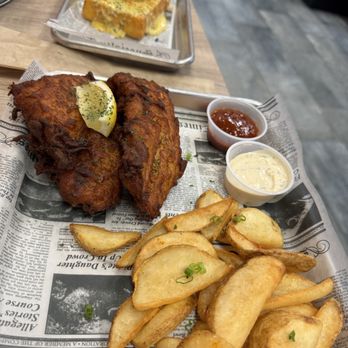 Melbourne Seafood Station - Haddock with fries and a side of cheddar grits - Seafood Near Me - Melbourne, Florida Melbourne Seafood Station - Haddock with fries and a side of cheddar grits - Seafood Near Me - Melbourne, Florida