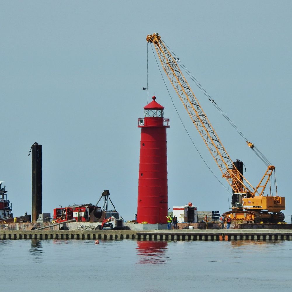 Grand Haven State Park - Working on the lighthouse. - Beaches Near Me - Grand Haven, Michigan Grand Haven State Park - Working on the lighthouse. - Beaches Near Me - Grand Haven, Michigan