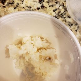 I assume these dark spots are from a rice cooker that wasn't cleaned all the way???? There was some dirty looking rice on the top too. I assume these dark spots are from a rice cooker that wasn't cleaned all the way???? There was some dirty looking rice on the top too.