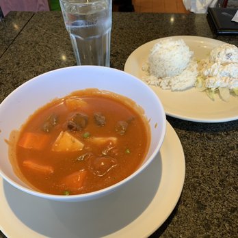 Liliha Bakery - Beef stew, rice, potato salad (choice of tomato salad, macaroni salad or potato salad). My potato salad has raisins & tuna. Ono! - Bakeries Near Me - Honolulu, Hawaii
