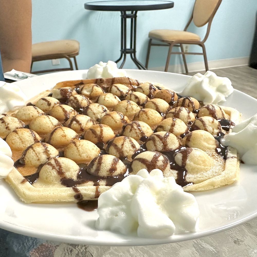 Sweet Corner Cafe - Bubble Waffle with chocolate syrup - Comfort Food Near Me - Aiea, Hawaii Sweet Corner Cafe - Bubble Waffle with chocolate syrup - Comfort Food Near Me - Aiea, Hawaii