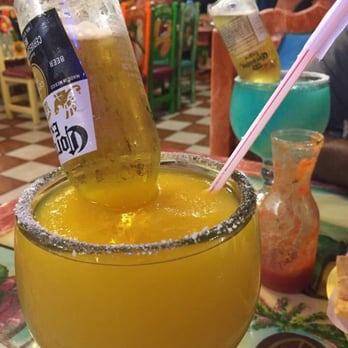 Dos Margaritas - This is the medium mango Margarita with Corona , you canon lay drink one & your done ... - Mexican Near Me - Fort Wayne, Indiana Dos Margaritas - This is the medium mango Margarita with Corona , you canon lay drink one & your done ... - Mexican Near Me - Fort Wayne, Indiana