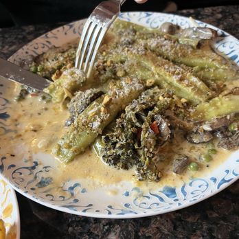 Laura - In house pasta with citrus ricotta stuffing, pistachio chili crème with Brocollini.  TO DIE FOR! - Italian Near Me - Summerville, South Carolina