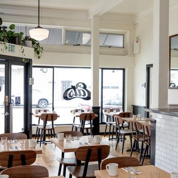 Eats - tables and chairs in a restaurant - American Near Me - San Francisco, California Eats - tables and chairs in a restaurant - American Near Me - San Francisco, California
