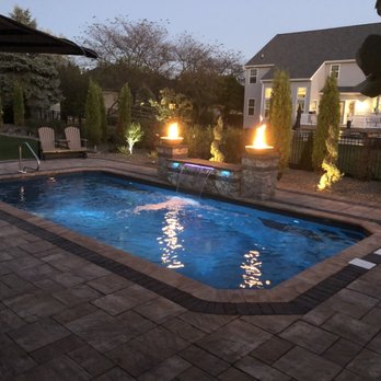 Stanford Scapes - a backyard pool with a fire pit - Landscaping Near Me - Mechanicsburg, Pennsylvania Stanford Scapes - a backyard pool with a fire pit - Landscaping Near Me - Mechanicsburg, Pennsylvania