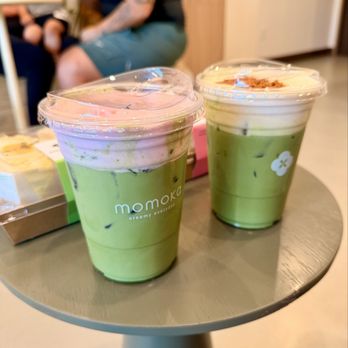 Momoka - Cherry Blossom Matcha & Popcorn Matcha (Left to right) - Coffee & Tea Near Me - Ontario, California Momoka - Cherry Blossom Matcha & Popcorn Matcha (Left to right) - Coffee & Tea Near Me - Ontario, California