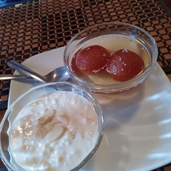 Mughlai Grill - Free dessert of rice pudding and Gulab Jamon because it was our first time - Indian Near Me - New York, New York