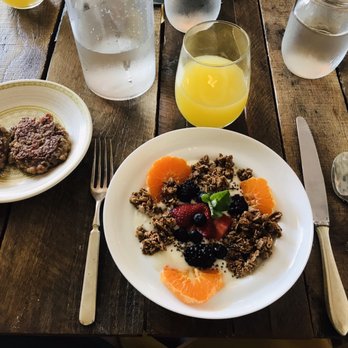 Yonder - Yogurt bowl, best sausage I've ever had, and a mimosa. Breakfast of champions! - Grocery Near Me - Franklin, North Carolina